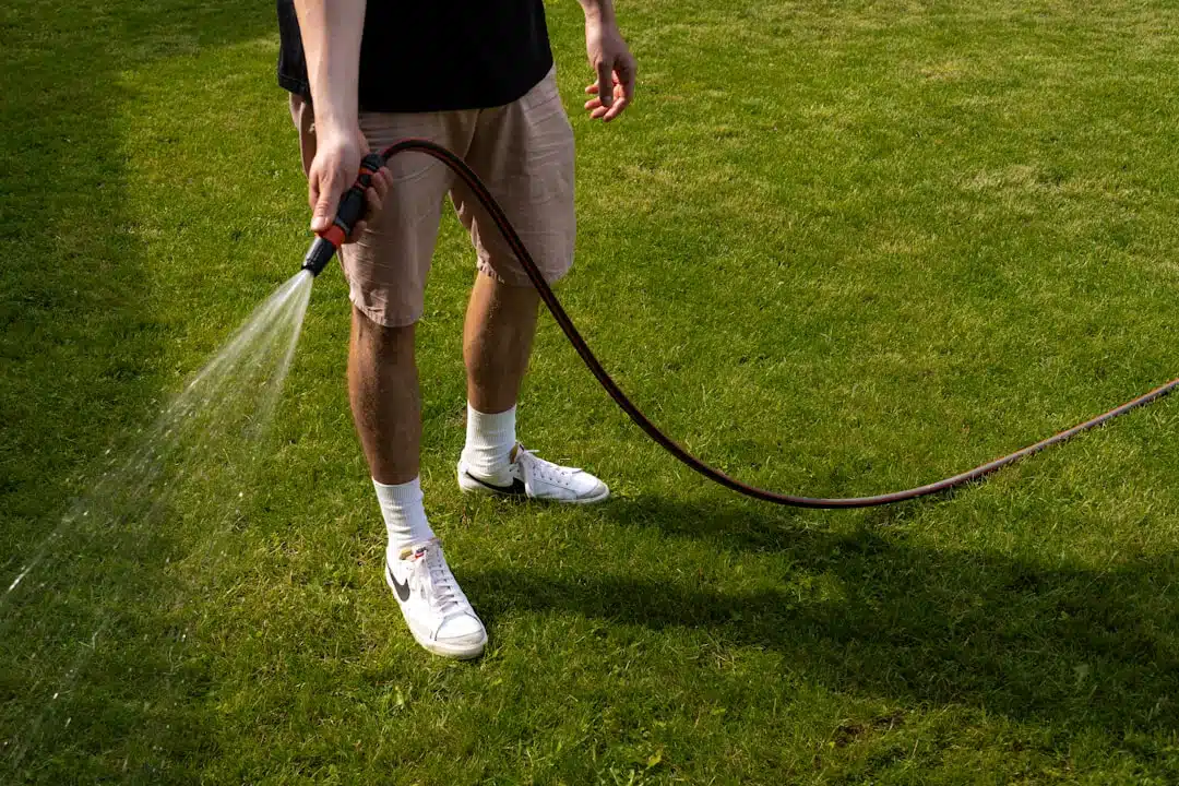 Applying liquid treatment to a lawn