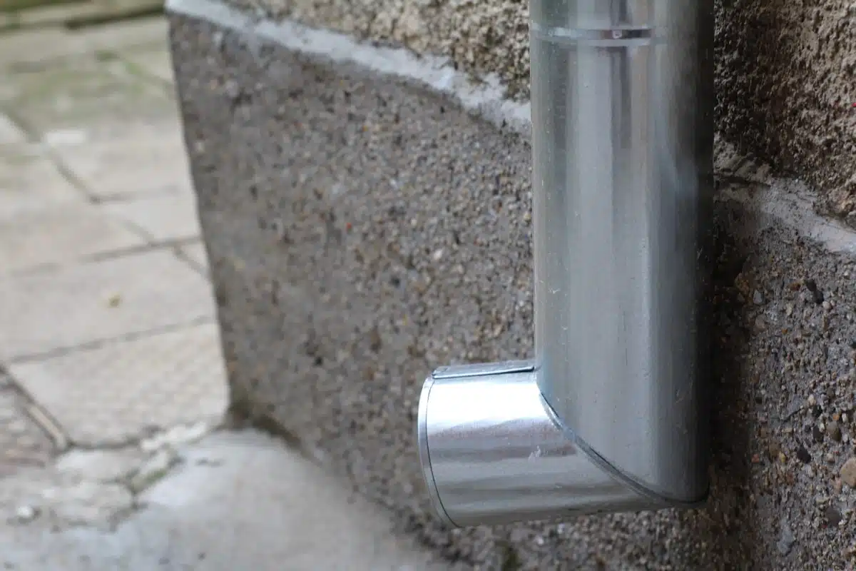 Metal gutter and downspout detail